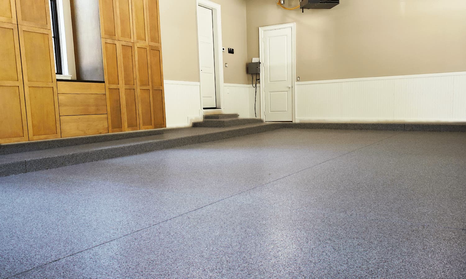 Finished polyaspartic coated garage floor after installation.